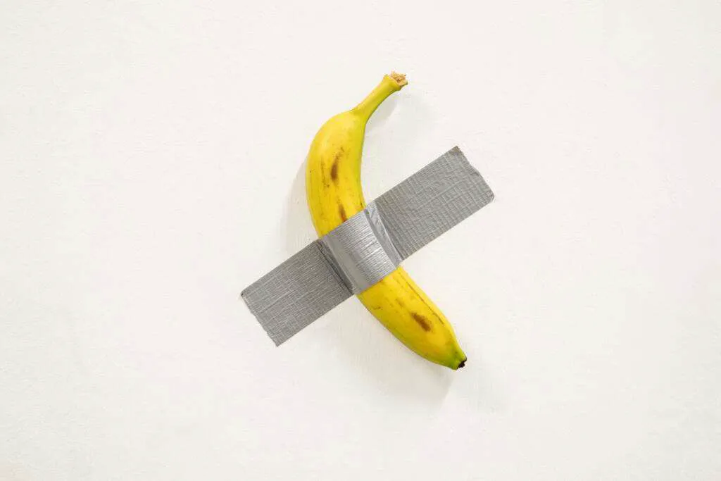 $6.2 Million Banana Taped to a Wall. The Buyer Ate It. Maurizio Cattelan, Comedian. Sold at Sotheby's New York in 2024.